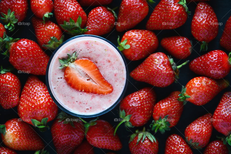 Strawberry smoothie. Strawberry smoothie on dark background