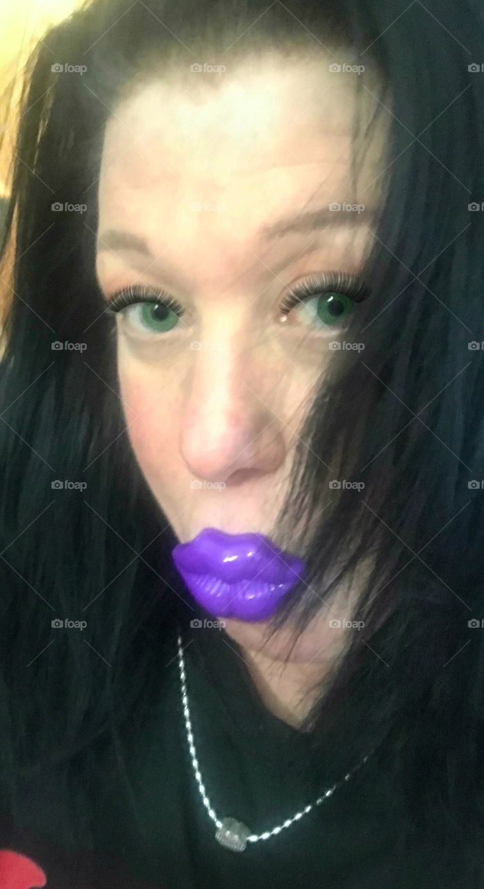 Silly brunette ( me) with bright purple Valentine lollipop 