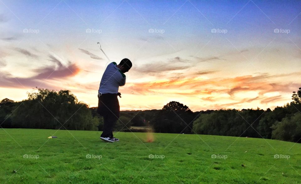 Sunset tee off