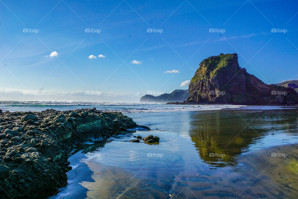 piha beach and its reflections