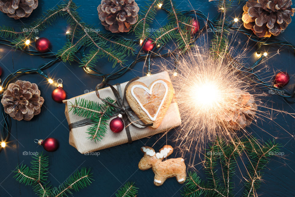 High angle view of christmas gift and cookies