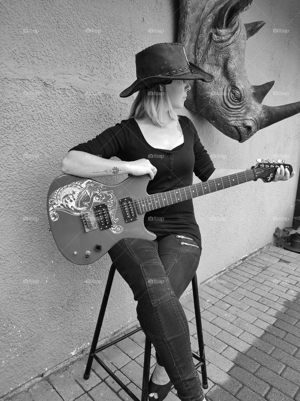 Female with Electric Guitar