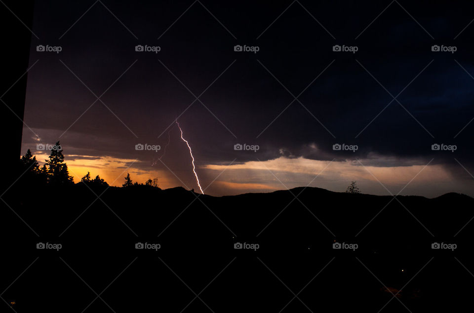 Storm cloud and lightning strike