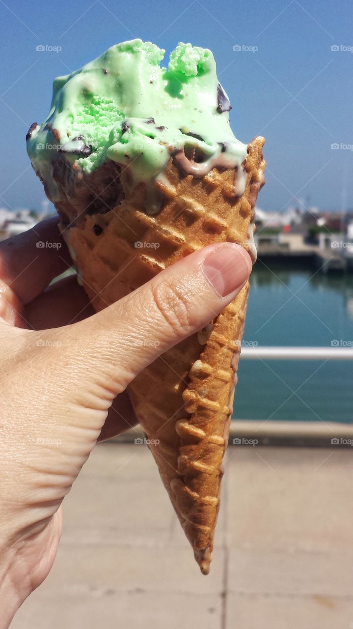 Hand holding ice cream