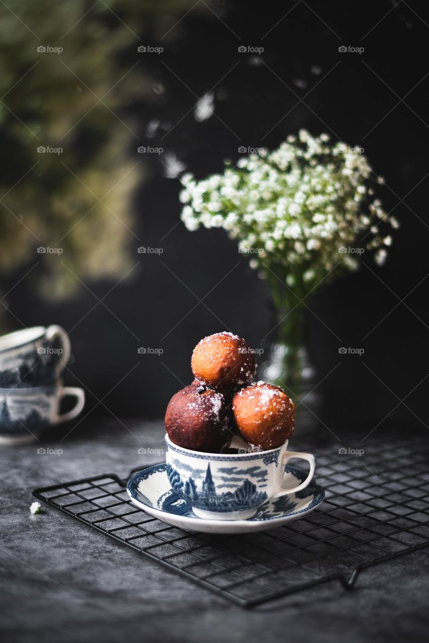 Deep fried doughnuts in a cup