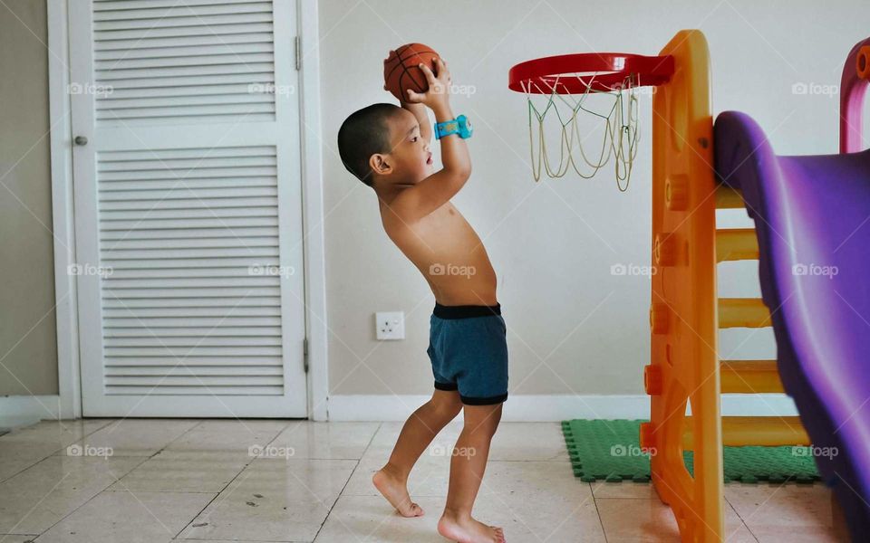 Boy playing Basketball