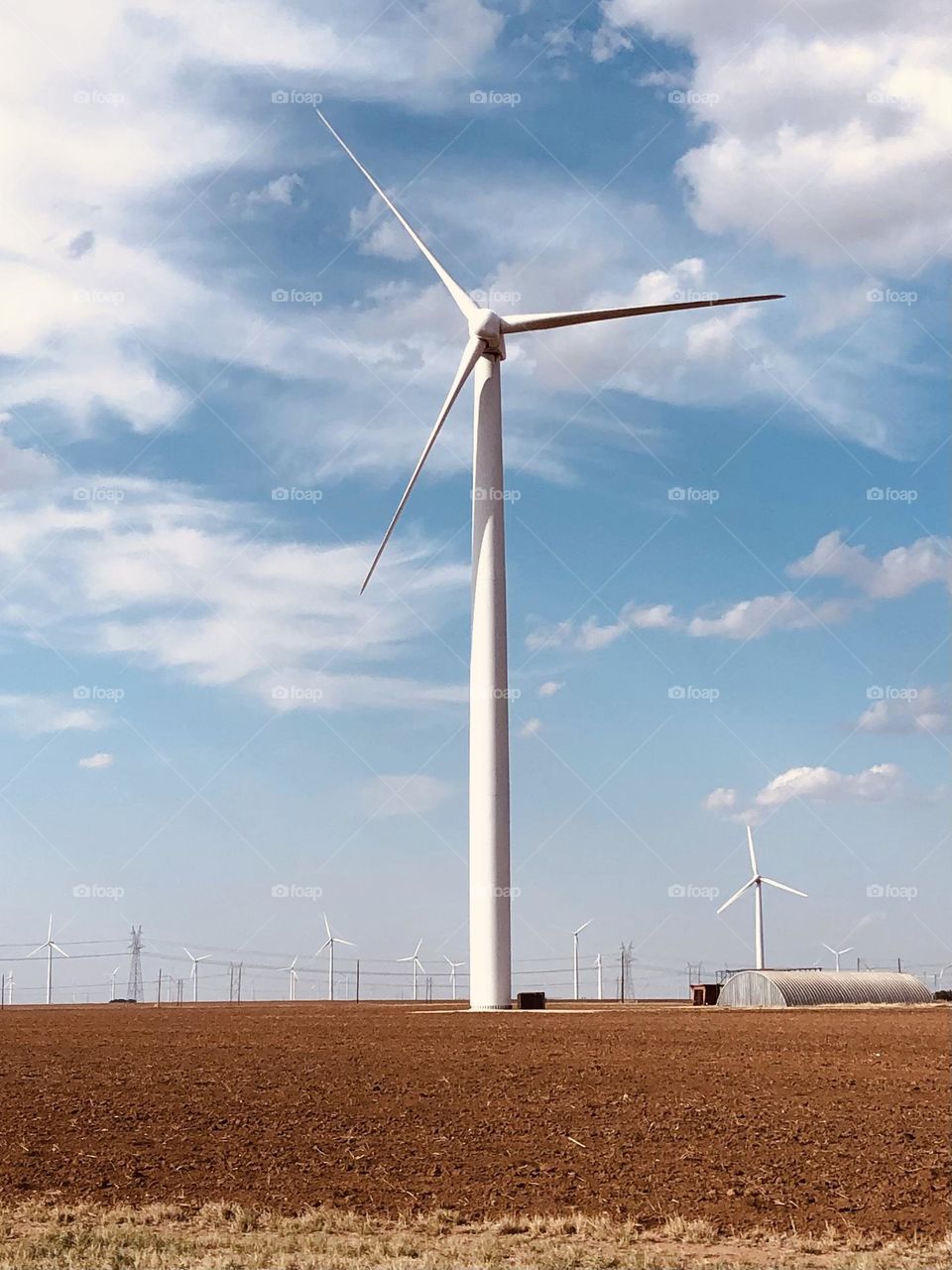 Driving 80ish mph to North Texas for my daughter’s graduation, had to take a pic of the giant windmills that splatter the terrain for power in Texas 👍🏻