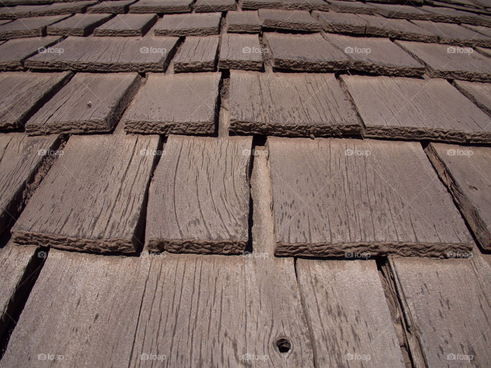 Very large brown wooden tiles with lots of texture from a barn in rural Central Oregon. 