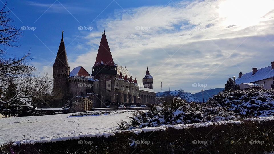 spring on snow at Corvin Castle, Romania