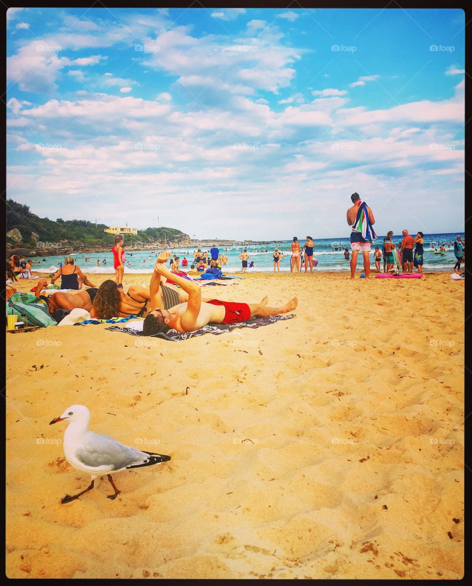 Relaxing on the beach- freshwater Sydney 