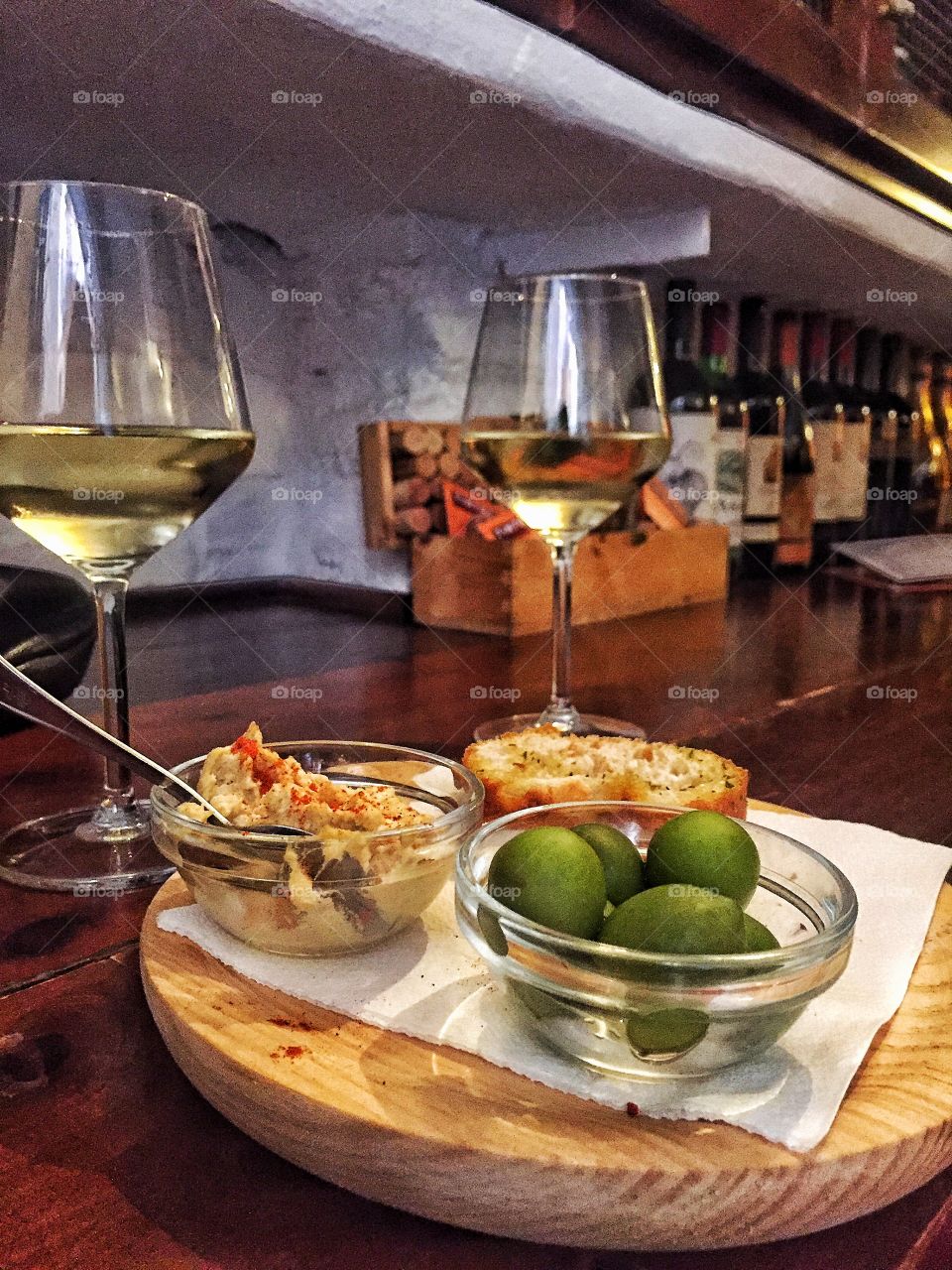 Close-up of tapas and wineglass