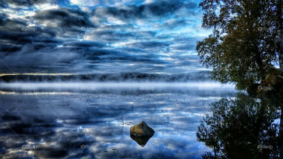 dance over the lake. Early morning in Sweden Dalarna Säter