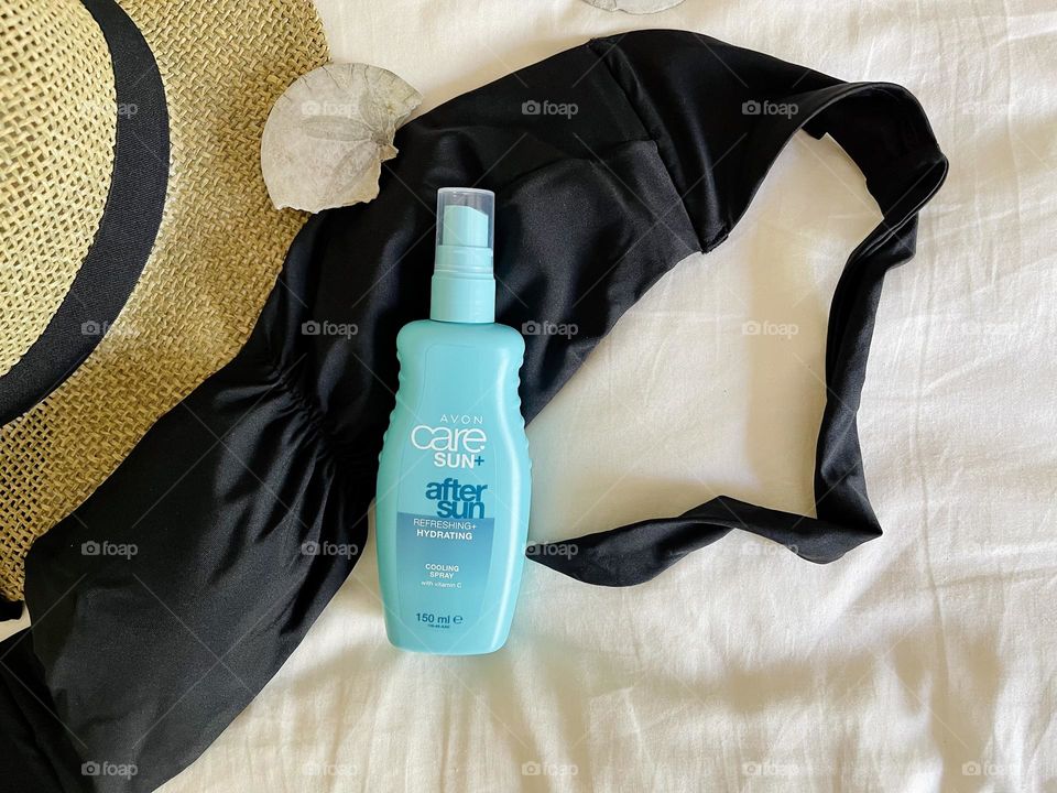 Avon after sun spray, top view 
