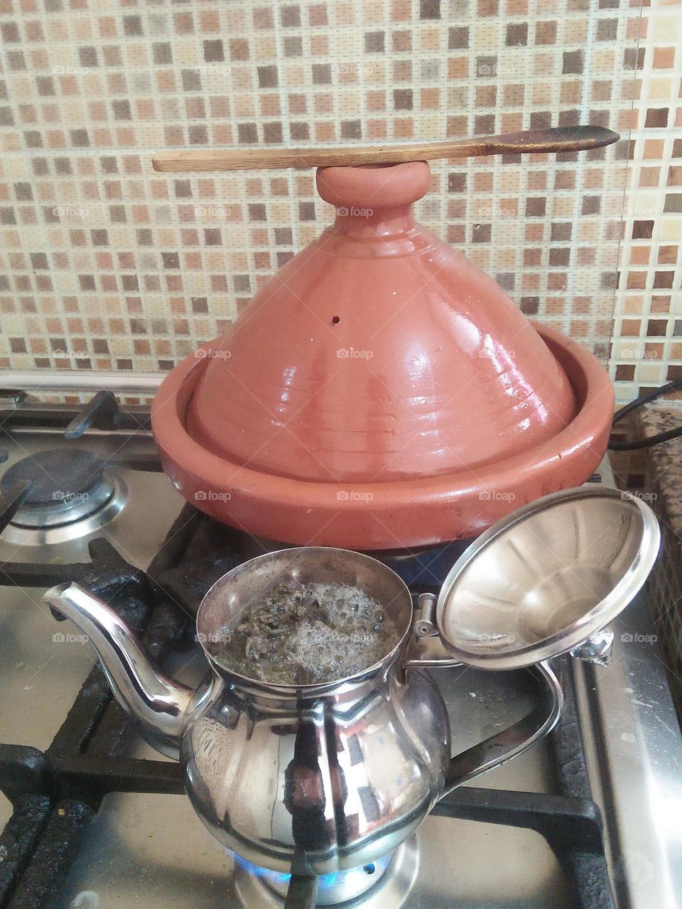 a tajine and a kettle of tea.