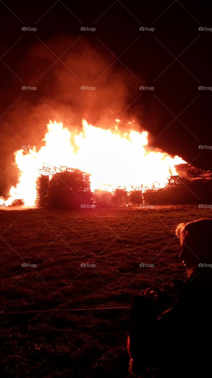 The age old tradition of bonfires for Guy Fawkes Day in United Kingdom; this bonfire takes the cake radiating heat and growing flames beyond your backyard fire.