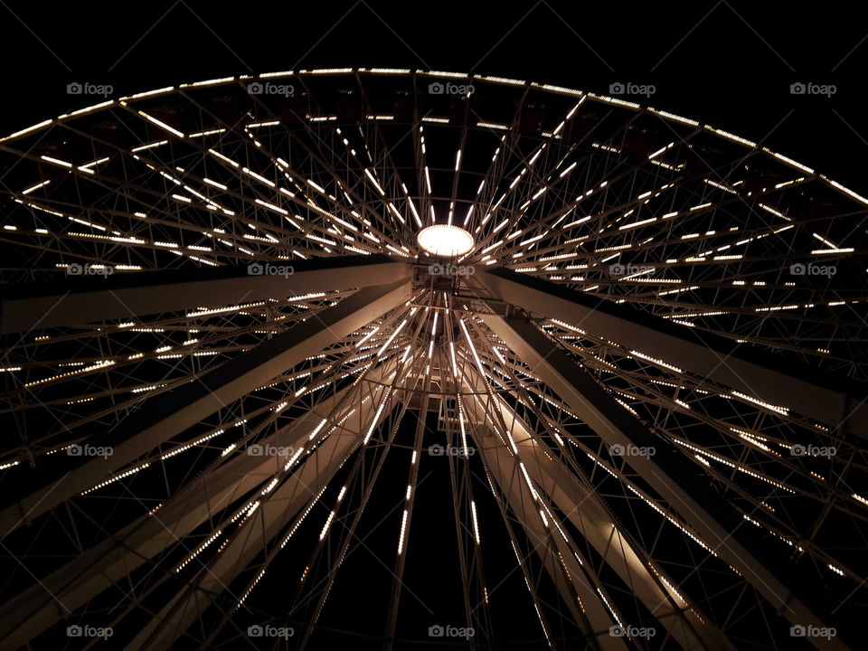 Wheel of Life. Giant wheel at night in Chicago. captured with all its intricacies.