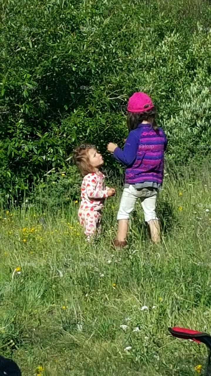 Sisters exploring.