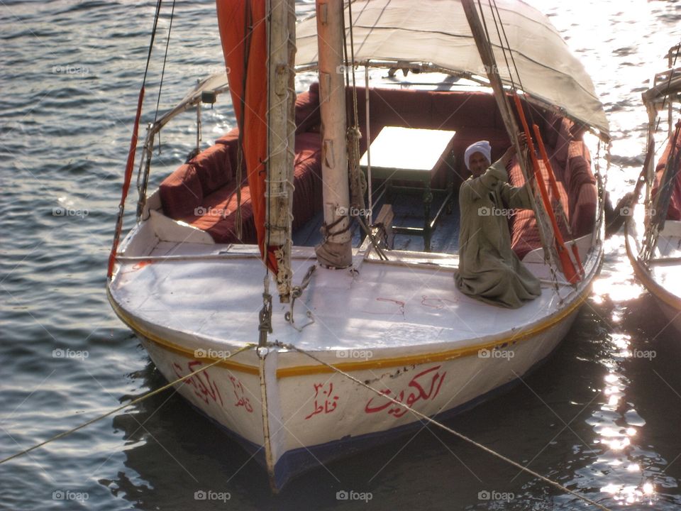 Wooden Sailing Boat. Traditional Covered Sailing Boat on the River Nile in Cairo