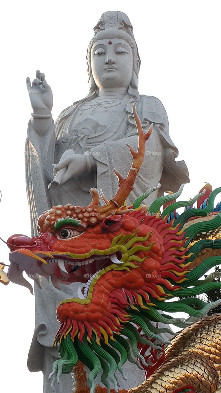 guanyin statue with dragon