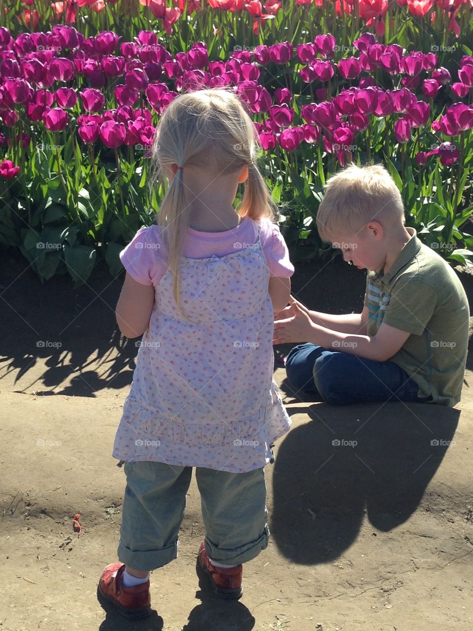Children and tulips