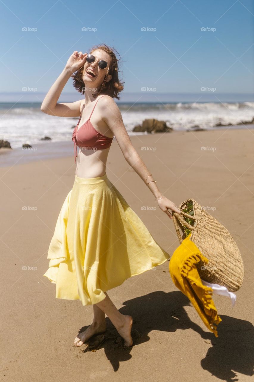 a very beautiful woman on the beach