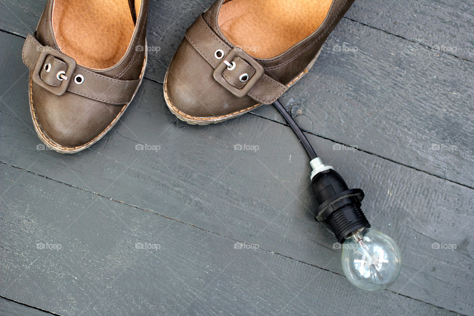 Shoes, women's shoes, a light bulb, a still life, a lifestyle, an idea, a new idea,