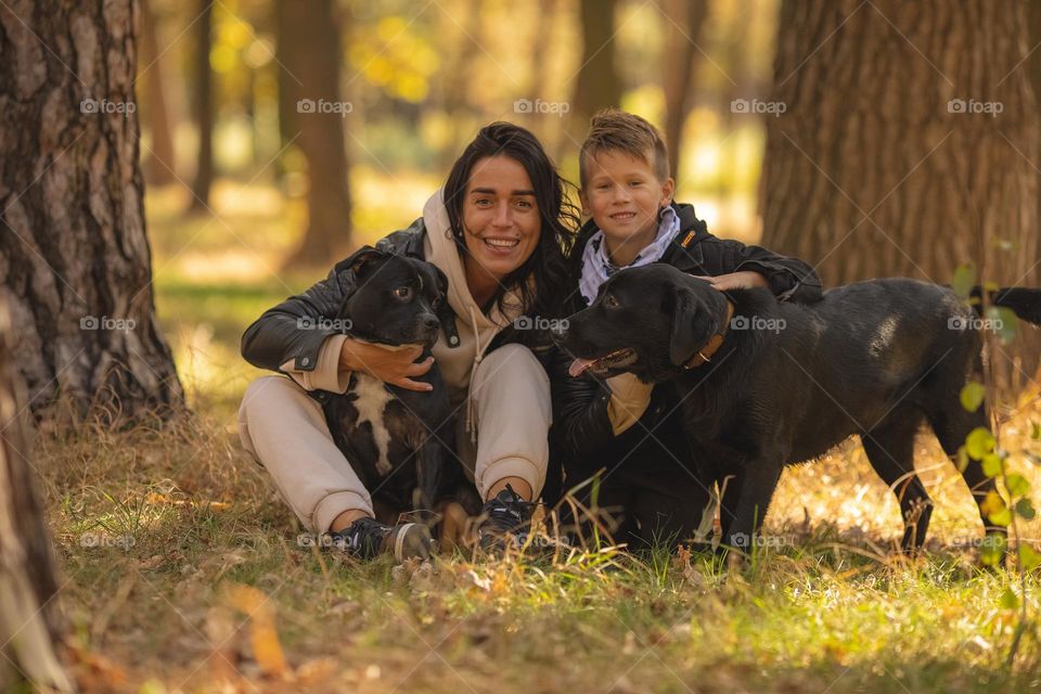 walking the dog, people walking the dogs on the street, they spend time together, the person plays with the dog, trains it, eat delicious food, take pictures. best friends are dogs. children and dogs for a walk
