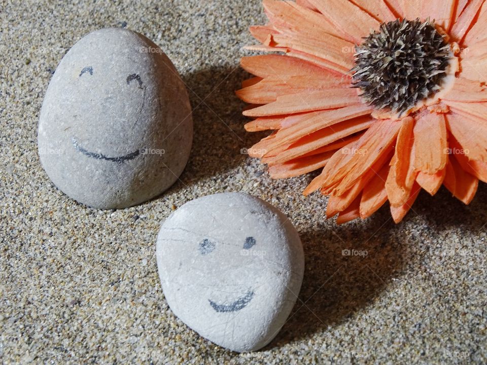 The stones of my son also smile.