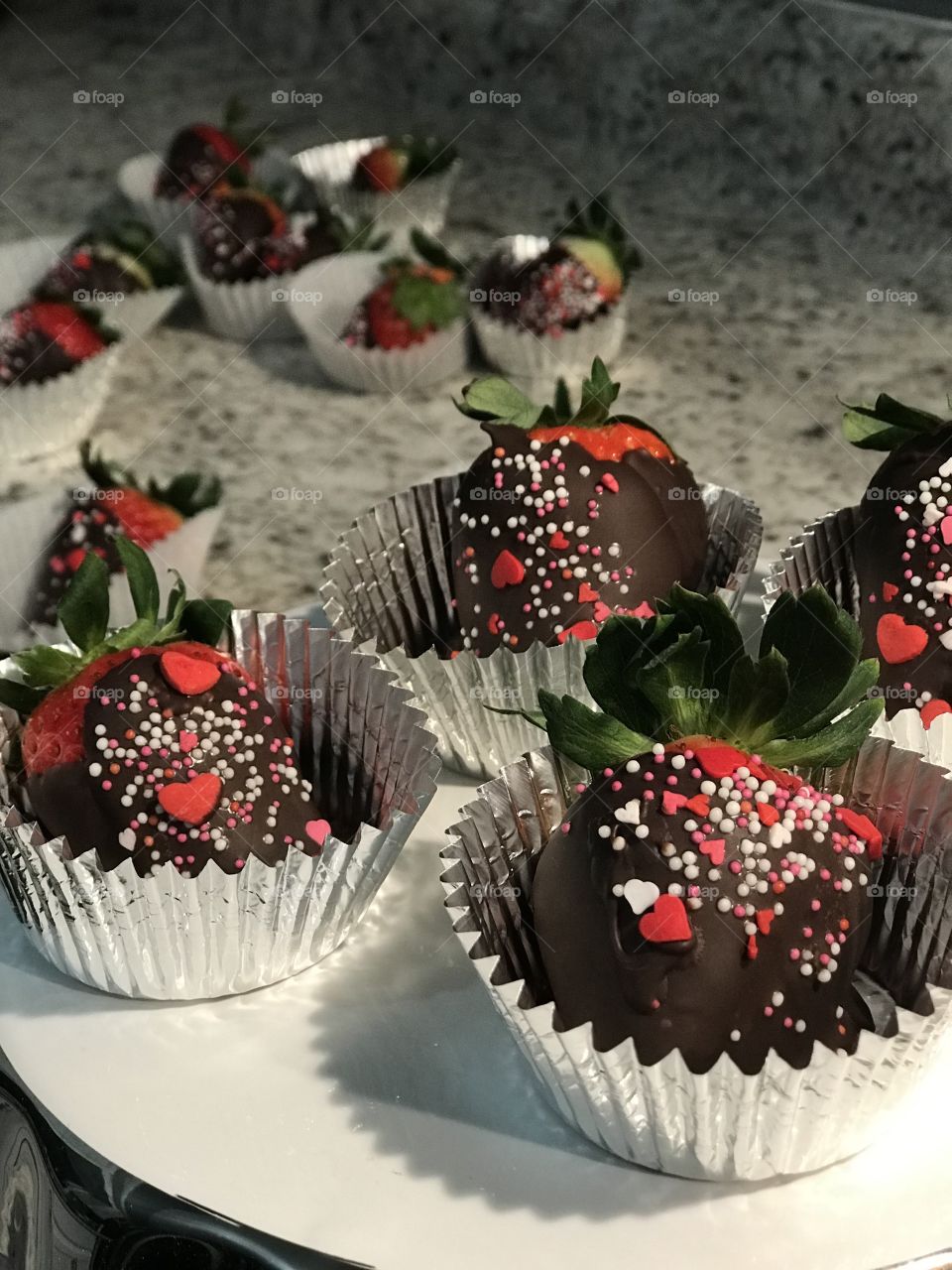Homemade chocolate covered strawberries with valentine’s day sprinkles 