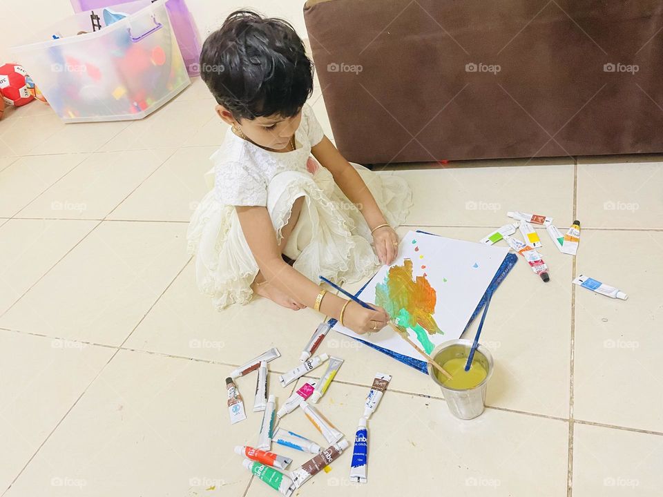 A child painting on a holiday