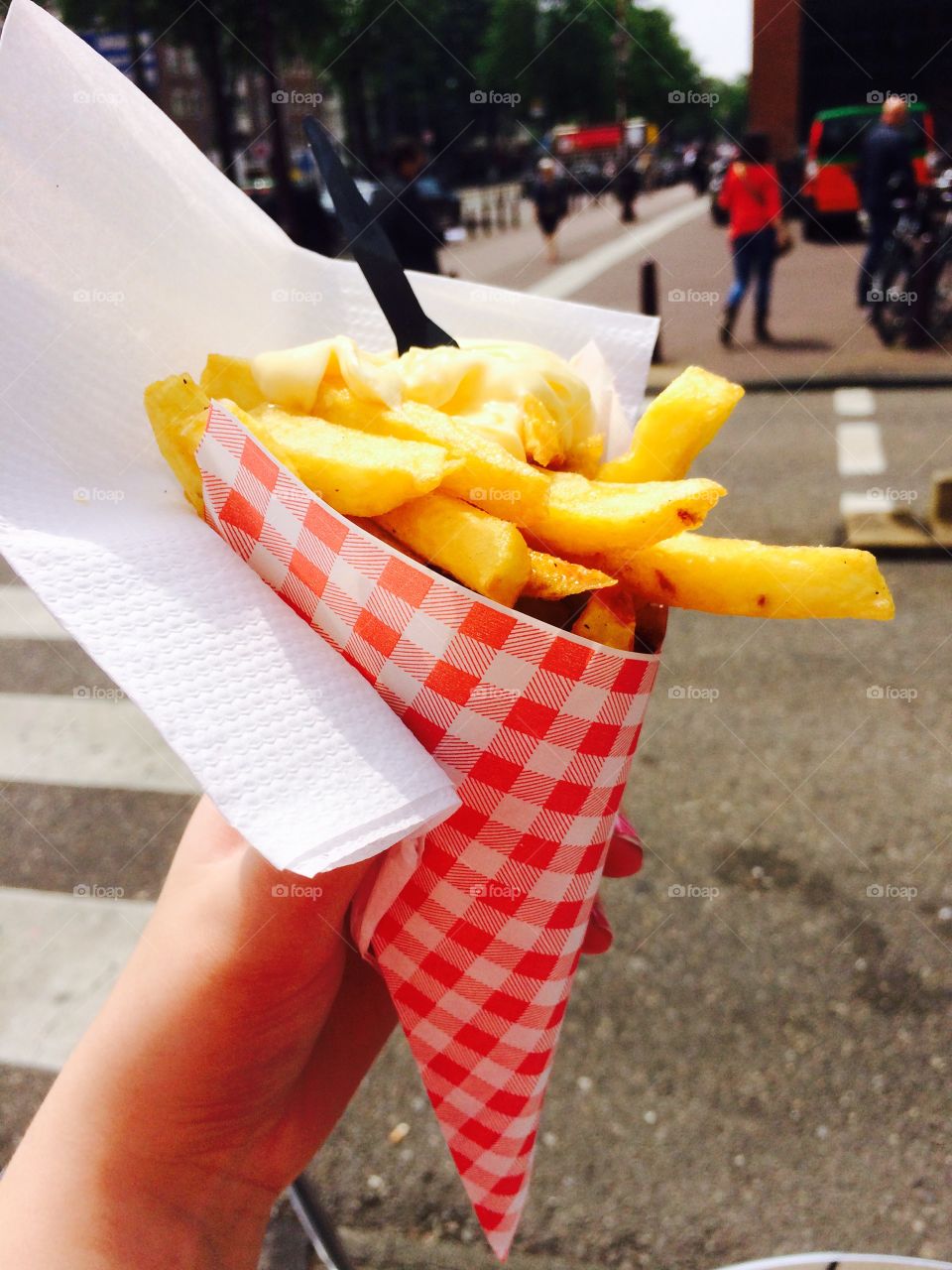 French fries with mayonnaise. I went to a two week trip in Europe and this was a great thing people are in Amsterdam! 