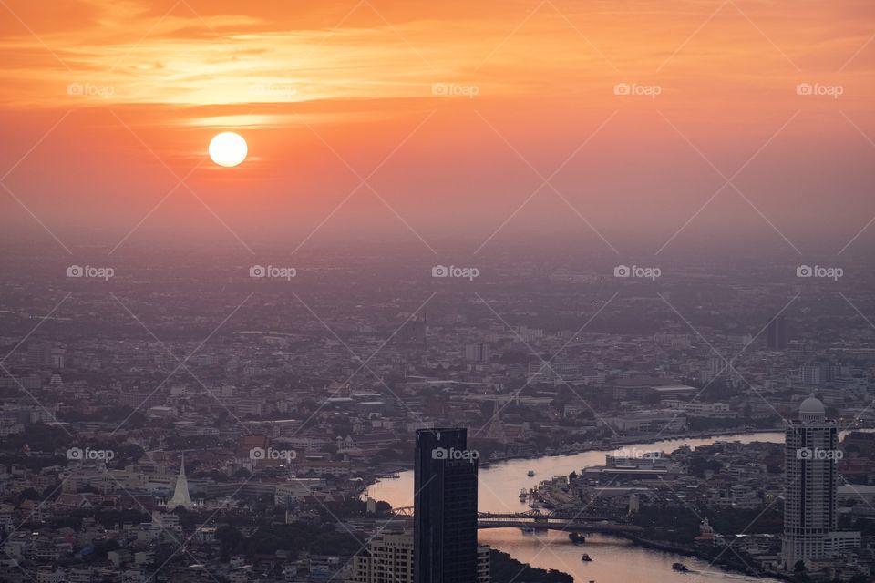 Sunset in the central city Roof top Mahanakorn building Bangkok Thailand 