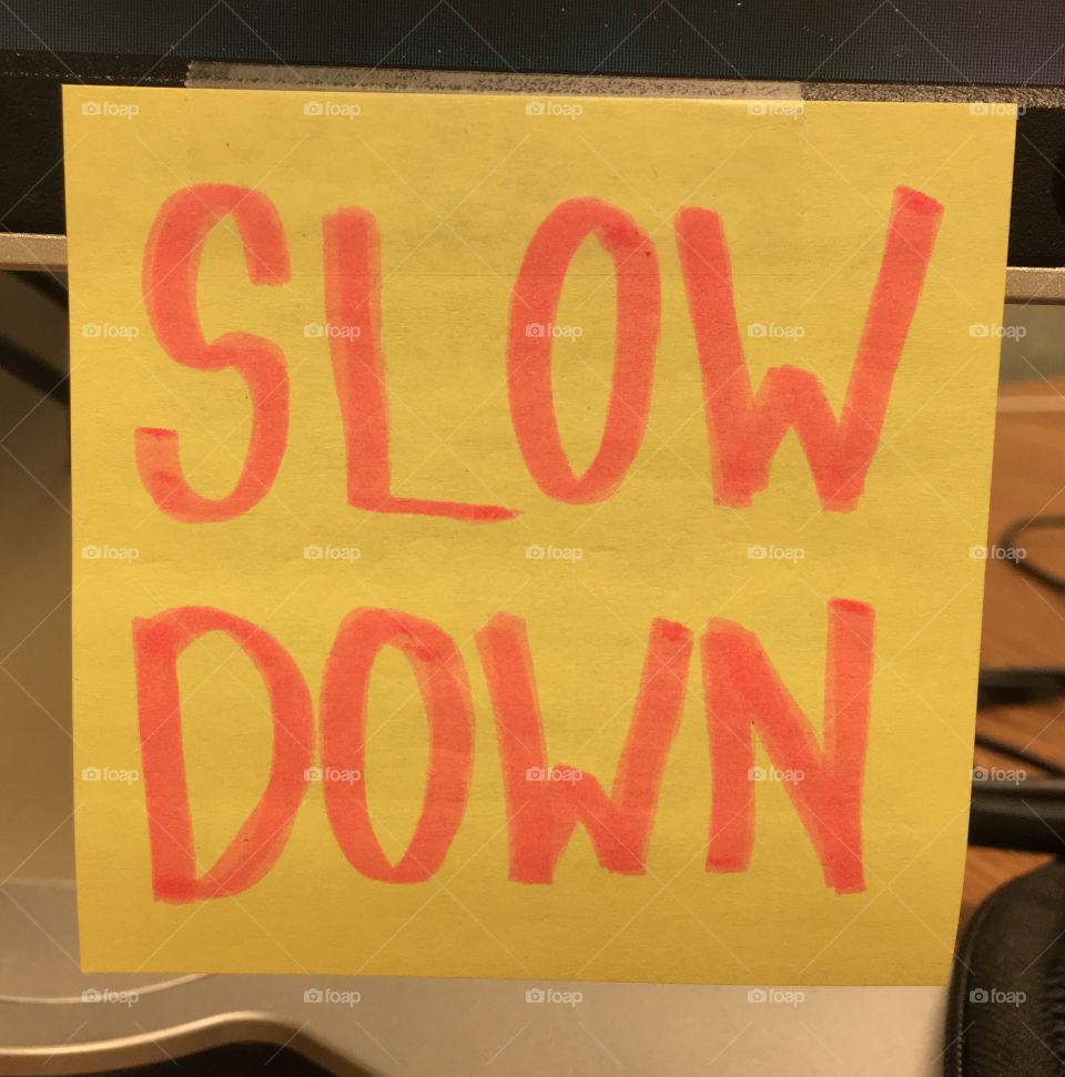 Slow down sticky note in office