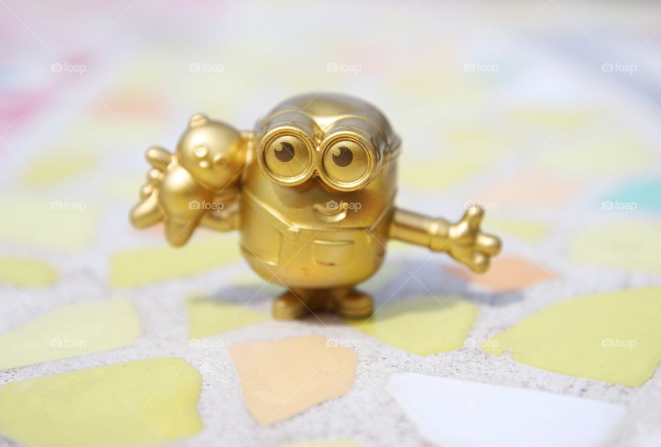 A golden minion toy