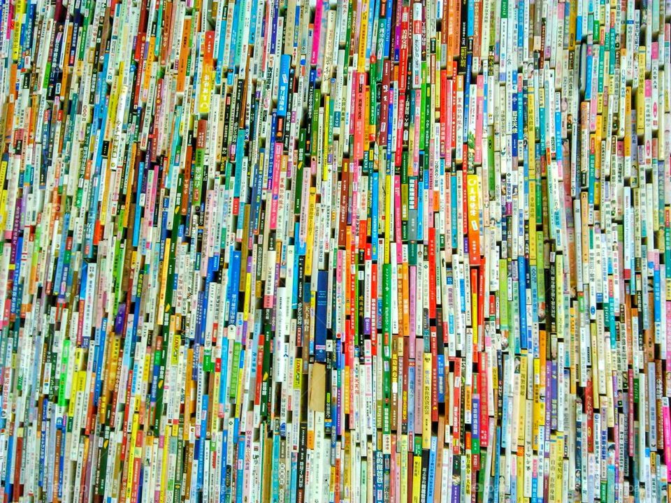 Clash of colors: New books had not been processed in the wall of library.