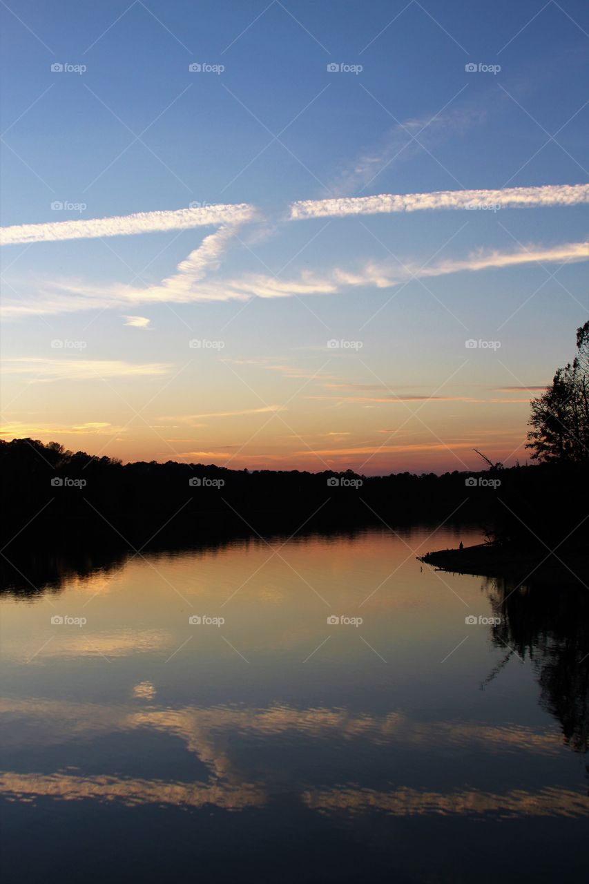 writing in the sky during sunset.