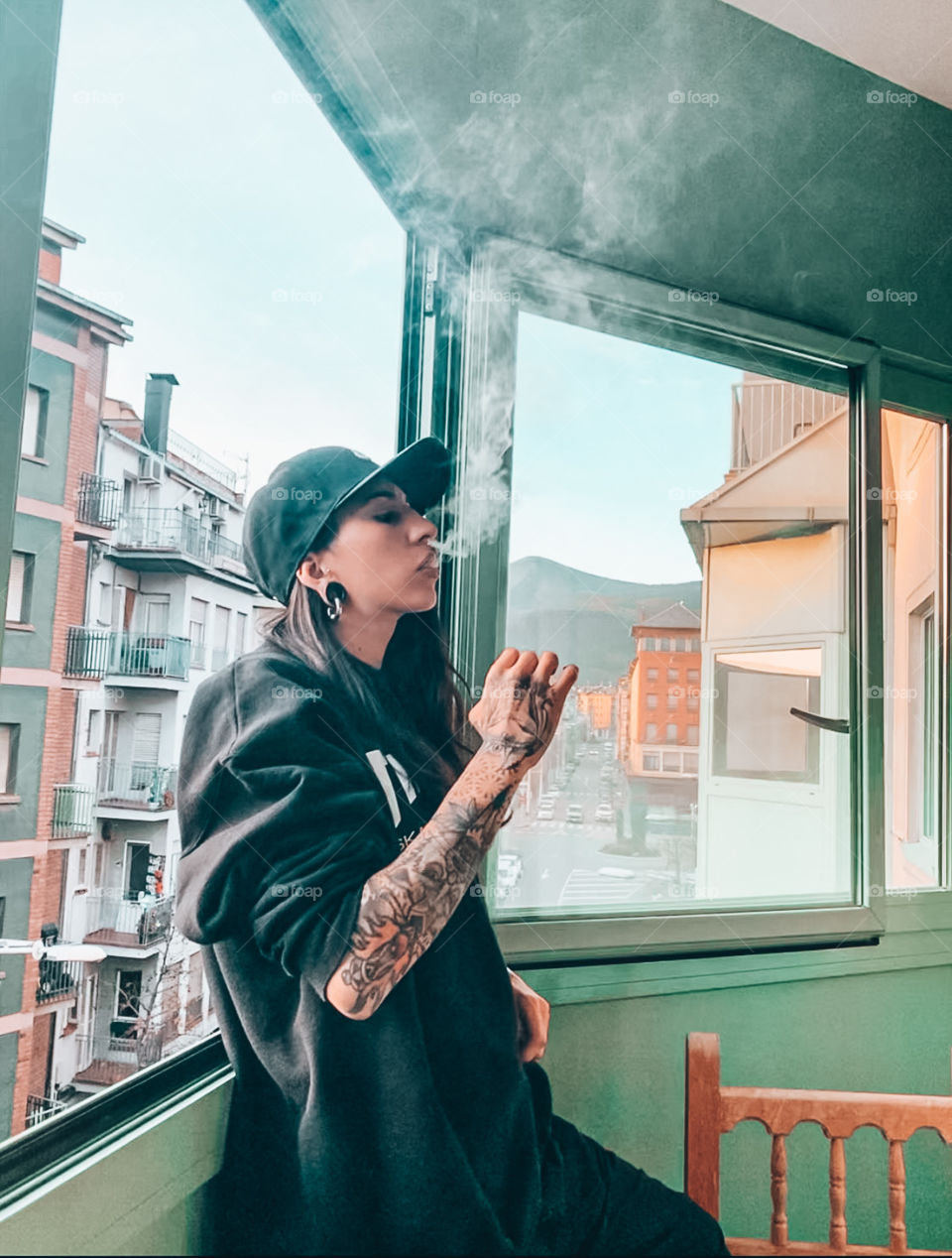 Portrait of a young girl smoking 