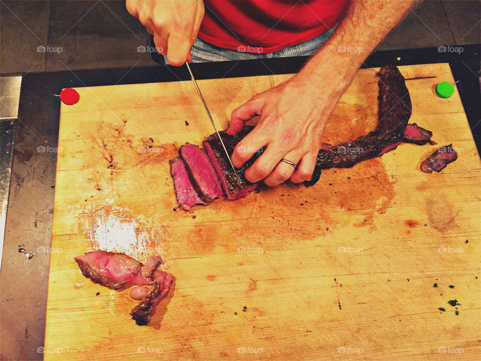 Person cutting wagu steak