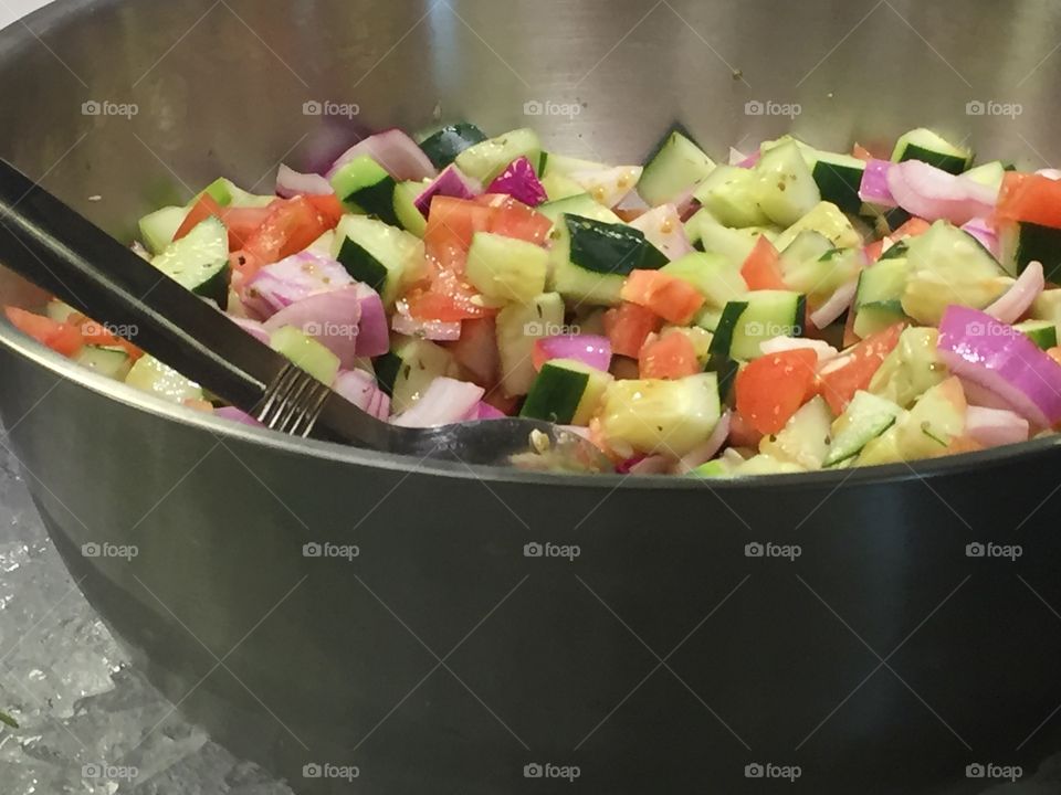 Fresh cucumber, tomato and onion salad