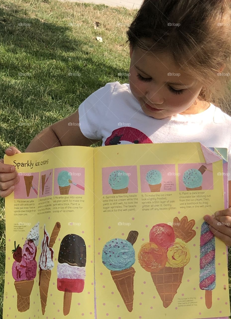 Reading A Book at the Park