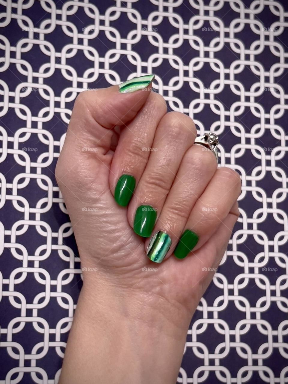 Pretty bright green gel nail polish manicure