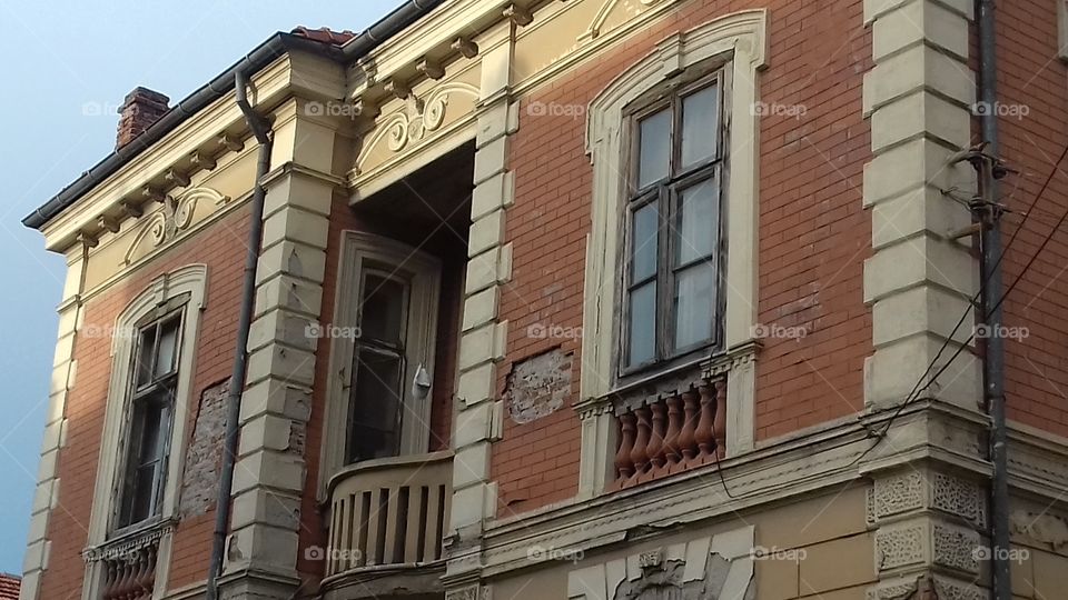 facade on old building damaged old classic architecture vintage city street house urban