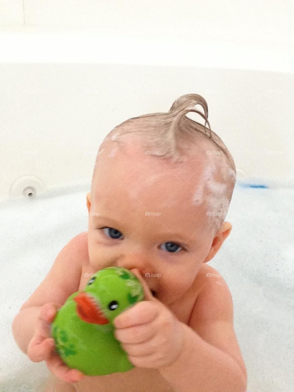 Baby bath time. Bubble bath for baby