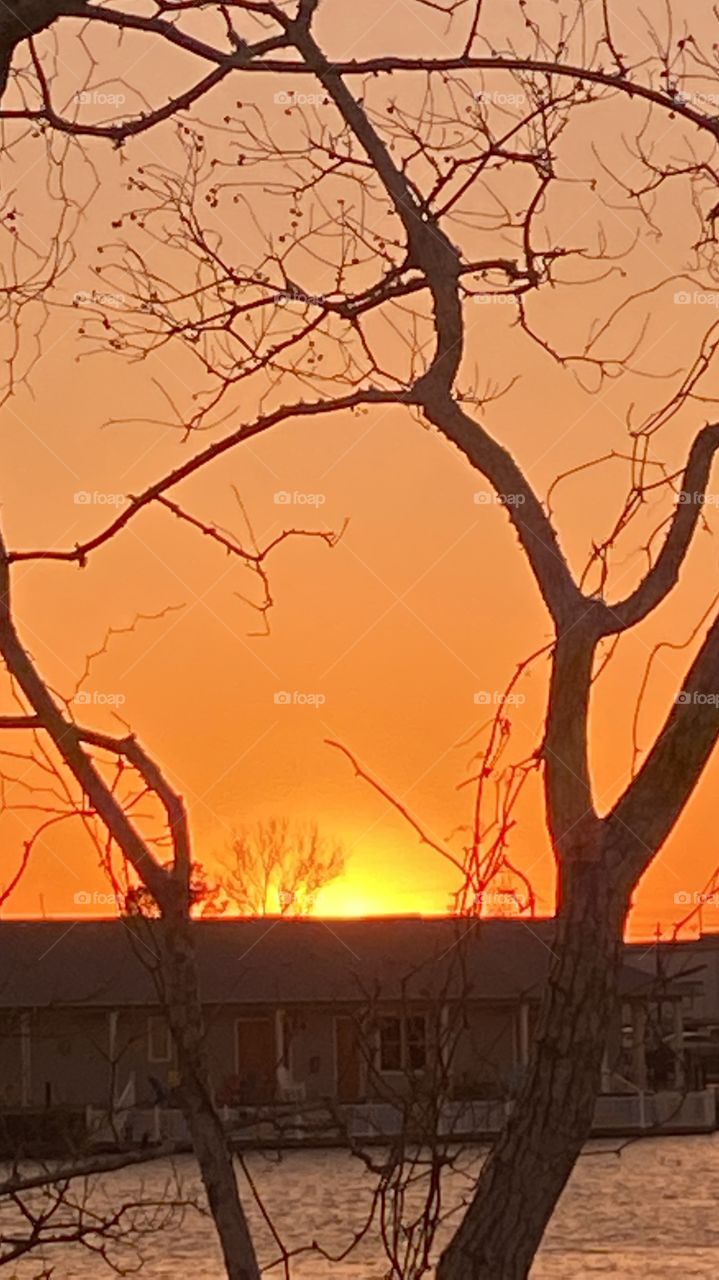Great evening for Sunset Sun still high with Yellow Highlights around Center. Evening Backlit glow dominate across the sky. 