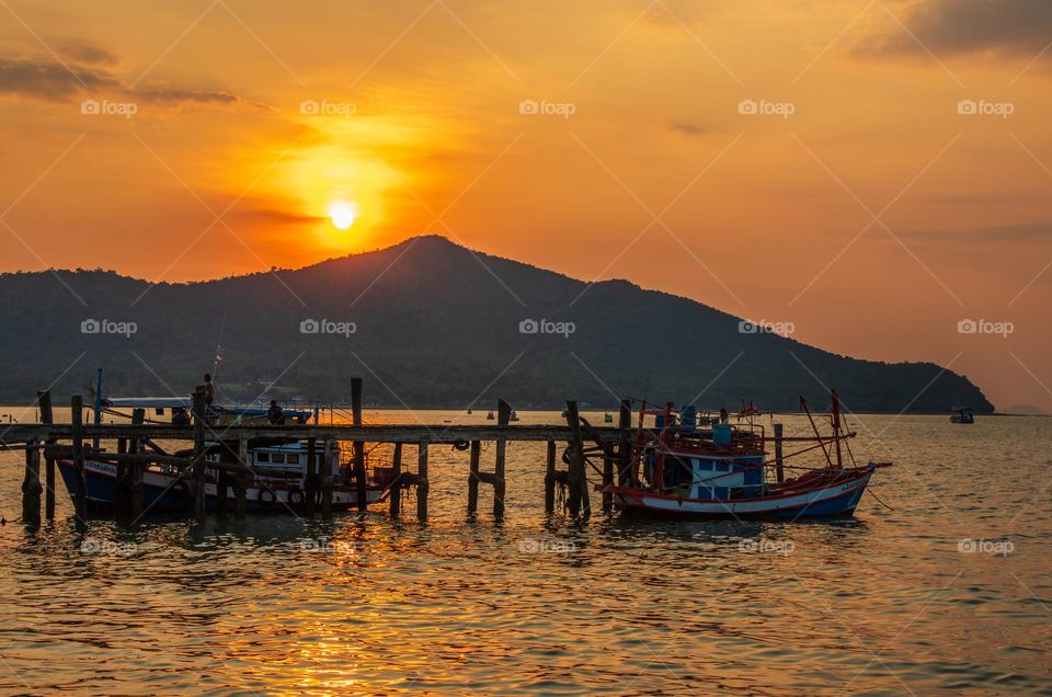 Thai Fisherman's Boats at a Fishing Pier in Bangsaray District Chonburi Thailand Southeast Asia during the Sunset Timeline