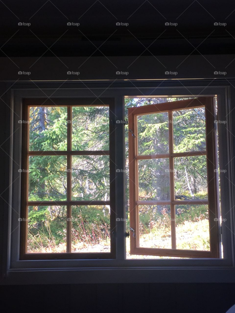 Cabin in mountains of Norway. Cabin bedroom window