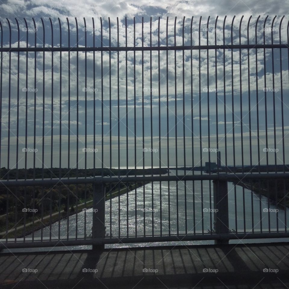 Traveling over the Cape Cod canal. Traveling across the Sagamore Bridge over the man-made Cape Cod Canal