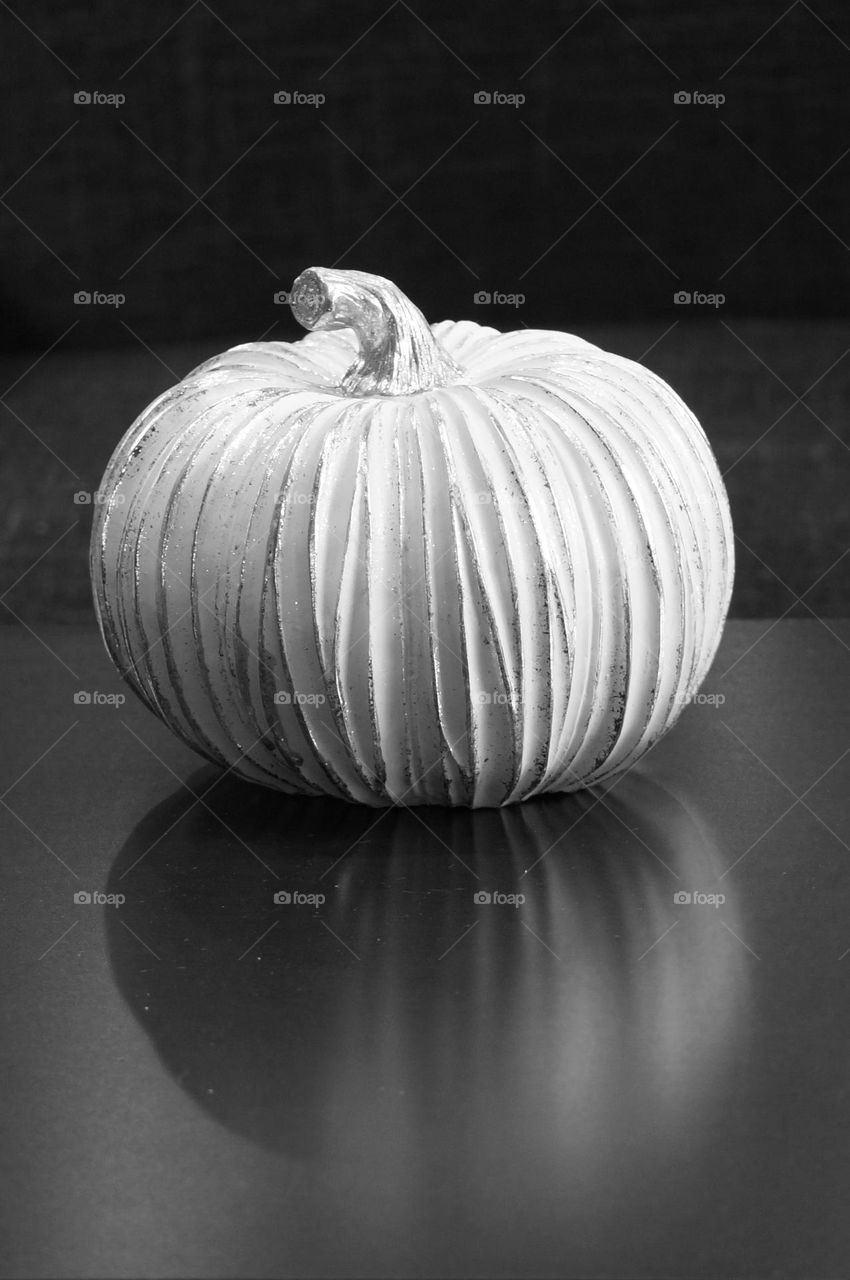 Pumpkin reflection in black and white