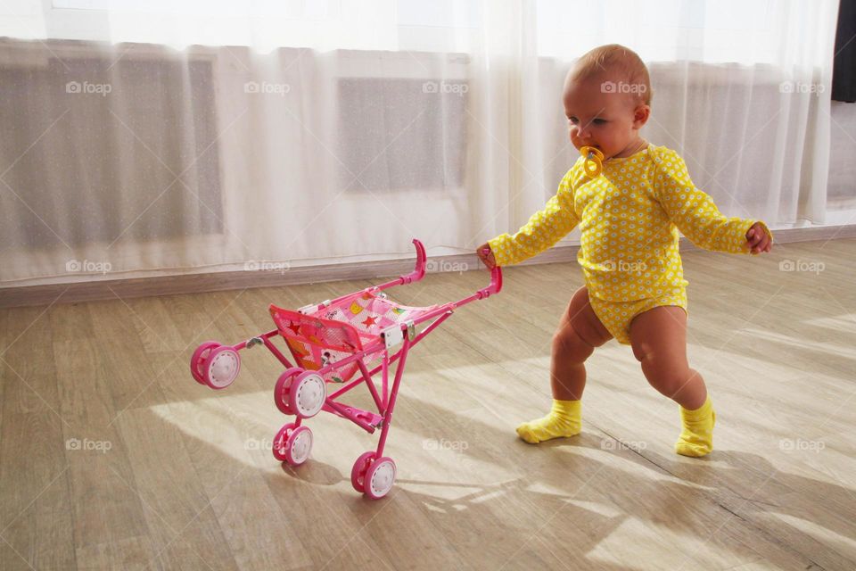 Small girl in yellow clothes. Small girl in yellow clothes