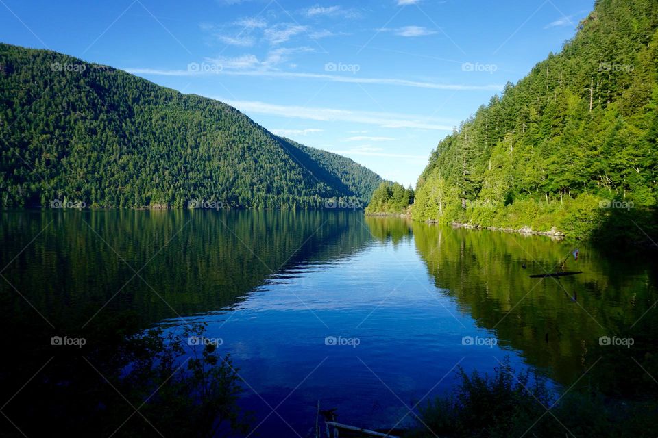 Beautiful Canadian Landscape … if you look carefully rhs of photo you can just make out a floating log/raft and Canadian flag 🇨🇦